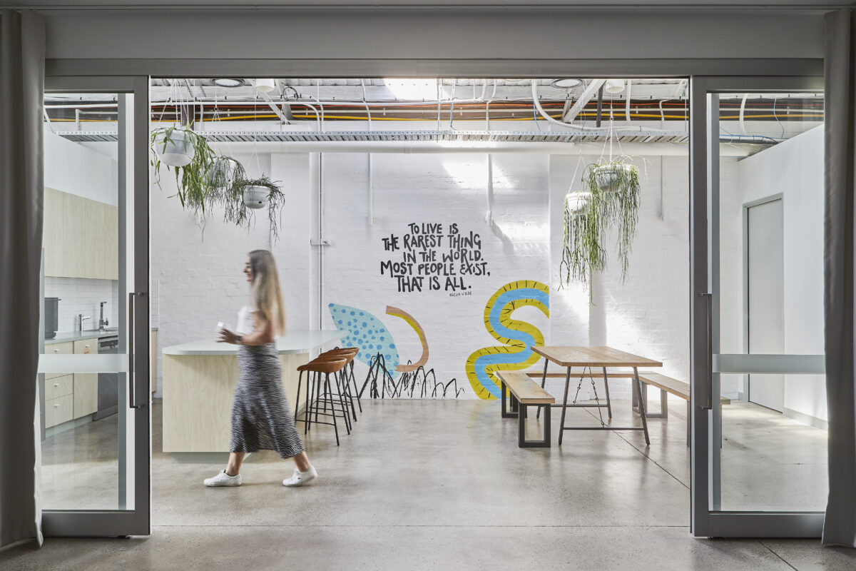 Co-working spaces with quote on wall